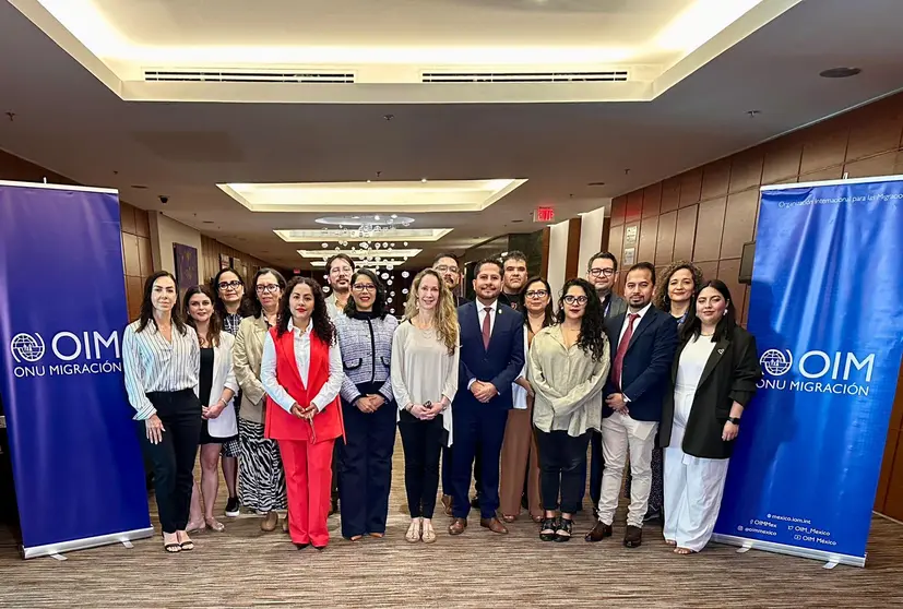 Participantes en el encuentro de la Organizaci&oacute;n Internacional para las Migraciones (OIM),